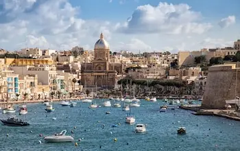 Sailing boats on Senglea marina in Grand Bay, Valetta, Malta