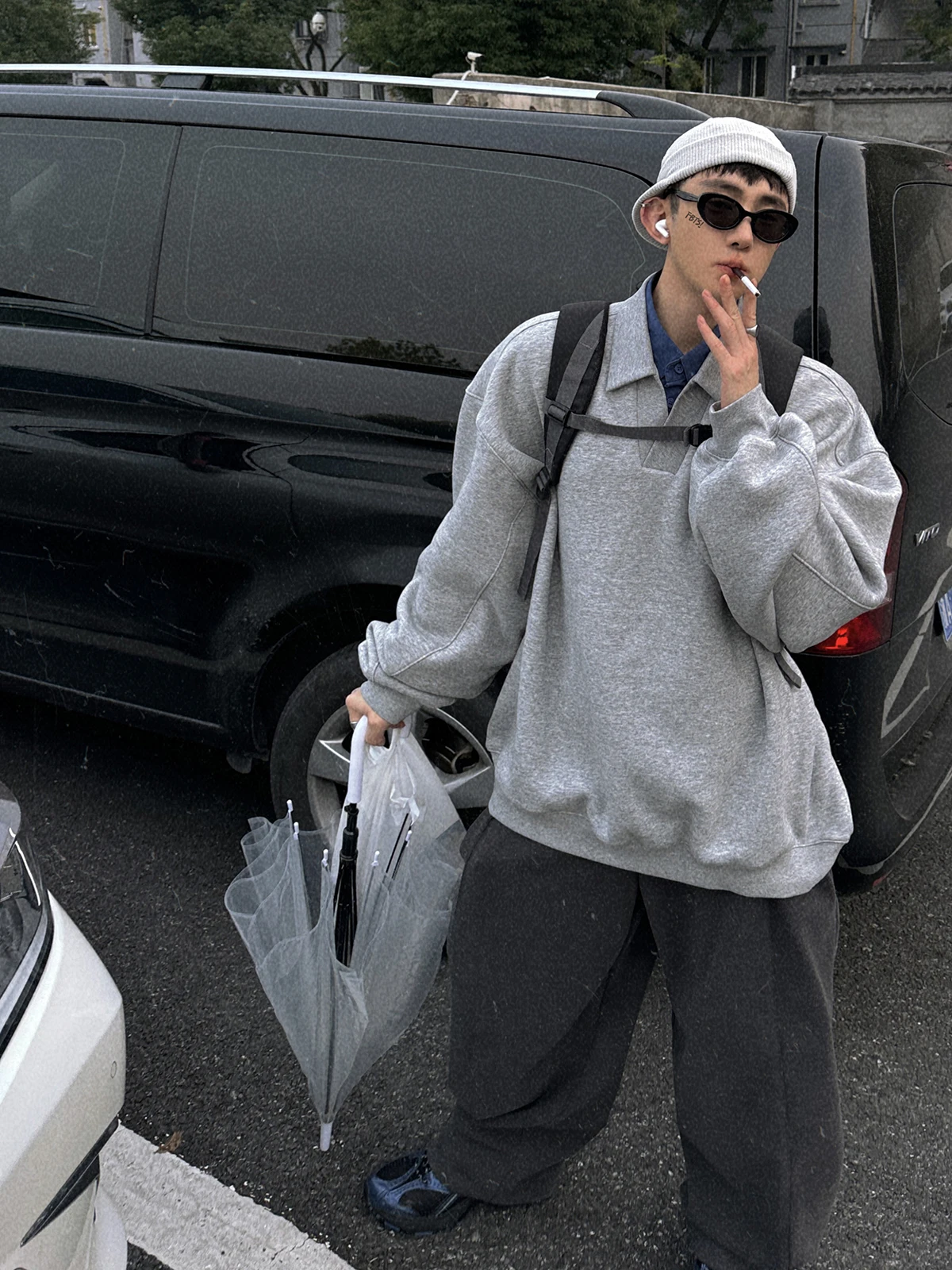 korean men's fashion: Gray Oversized Fleece Pullover + Dark Wide-Leg Trouser + White Cap + Black Sunglasses