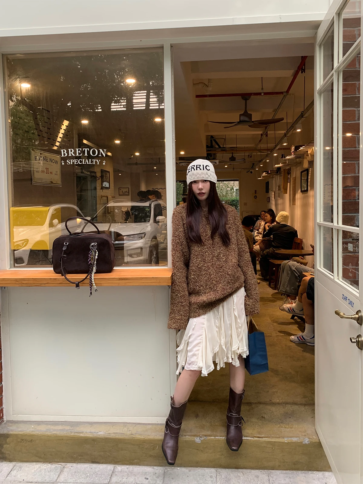 Cozy Korean Fall Look: Oversized Sweater with Silk Skirt and Cowboy Boots