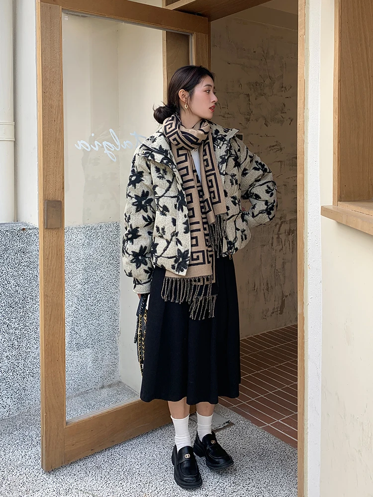 Chic Korean Winter Look: Patterned Jacket with Midi Skirt and Statement Scarf