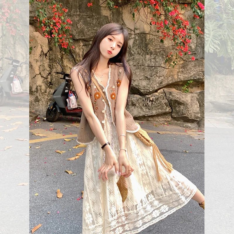 Crochet Daisy Vest + Pearl-Trim Lace Midi Dress + Tasselled Straw Crossbody + Delicate Bracelets + Tan Suede Ankle Boots