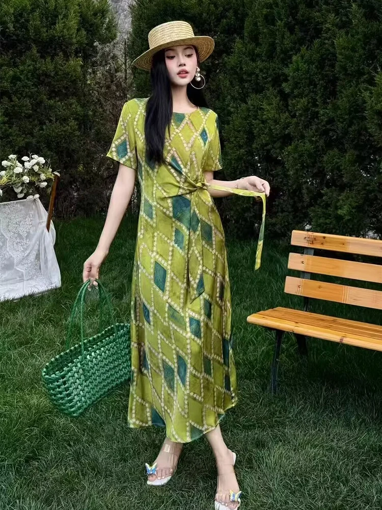 Straw Boater Hat + Green Diamond-Print Wrap Midi Dress + Woven Emerald Tote + Hoop Earrings + Clear Butterfly-Adorned Mules