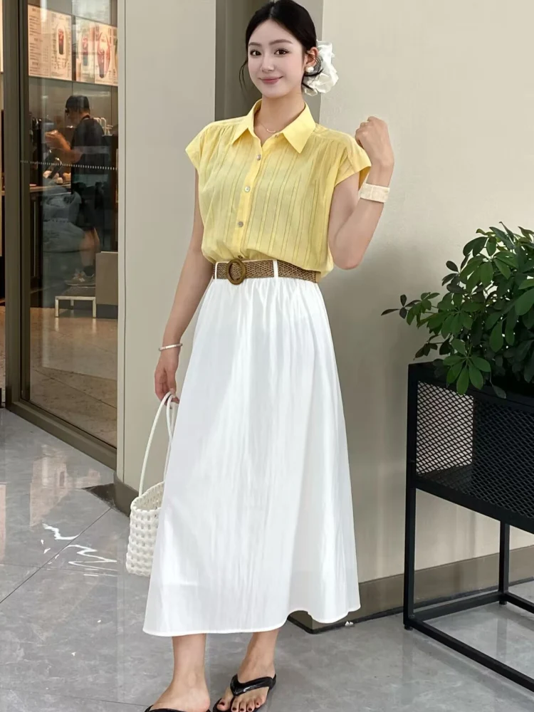 Butter-Yellow Cap-Sleeve Blouse + White A-Line Midi Skirt + Tan Woven Belt + Mini Basket Bag + Oversize Organza Hair Bow + Black Thong Sandals