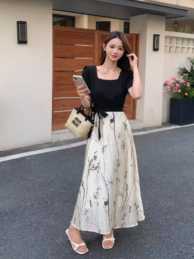 Square-Neck Black Tie-Waist Top + Brush-Stroke Linen Maxi Skirt + Straw Bucket Bag + Pearl Studs + White Strappy Block Heels