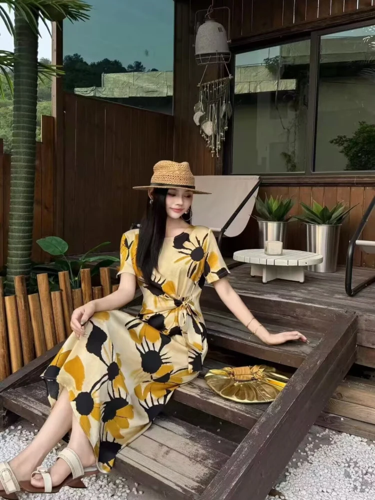 Straw Hat + Mustard-On-Black Sunflower Wrap Midi + Velvet Circle Clutch + Hoop Earrings + Ivory Double-Strap SandalsStraw Hat + Mustard-On-Black Sunflower Wrap Midi + Velvet Circle Clutch + Hoop Earrings + Ivory Double-Strap Sandals