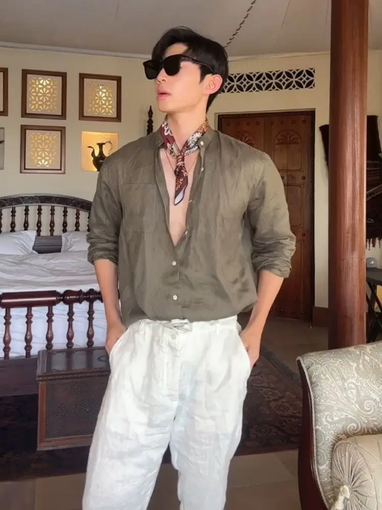 Black Sunglasses + Patterned Neck Scarf + Olive Linen Shirt + White Linen Trousers + Espadrille Loafers