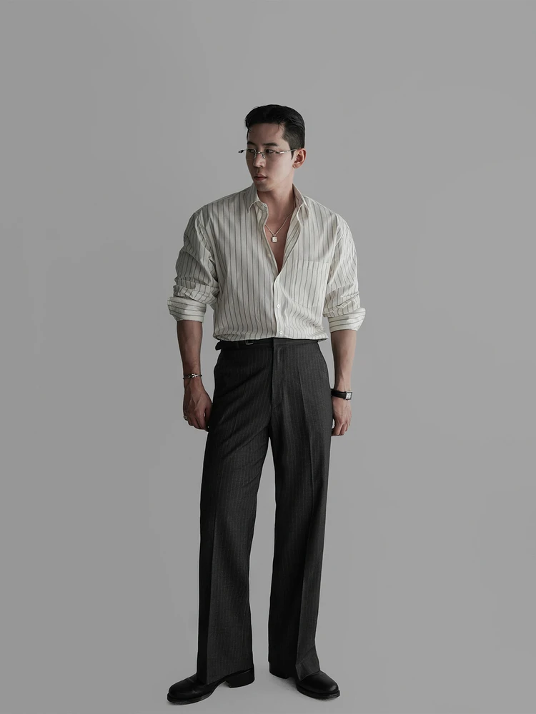 Rectangular Glasses + Fine-Stripe Camp-Collar Shirt + Silver Pendant + Charcoal Pinstripe Trousers + Black Derby Shoes