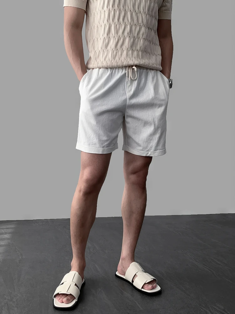 Textured Beige Knit Tee + White Drawstring Shorts + Cut-Out Slide Sandals