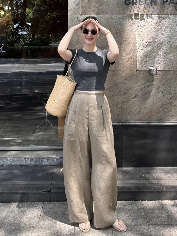 Round Sunglasses + Charcoal Fitted Tee + Sand Linen Wide-Leg Trousers + Pale Flip-Flop Sandals