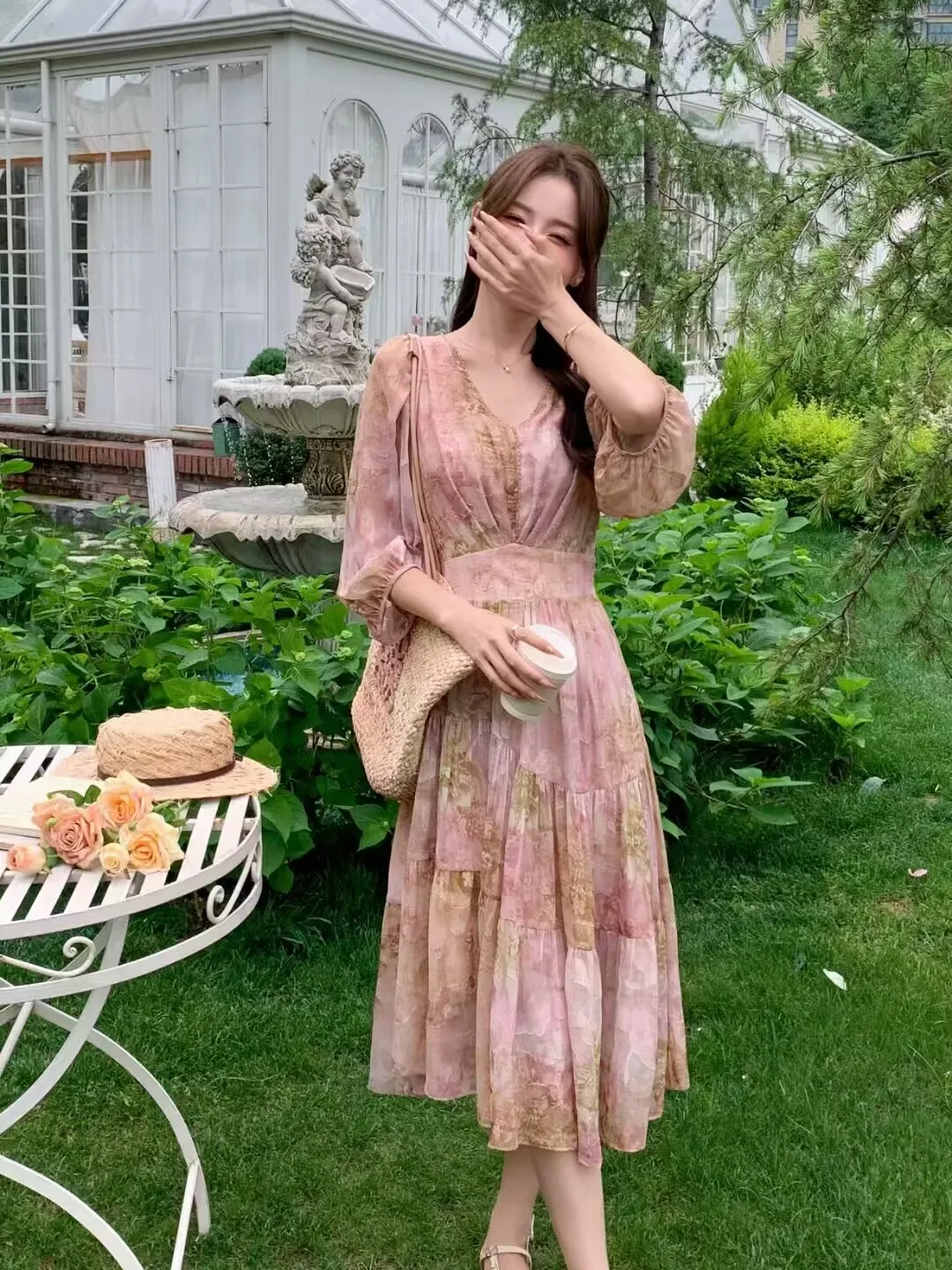 Blush Scrunchie + Rose-Patchwork Puff-Sleeve Tiered Midi Dress + Straw Tote + Beige Ankle-Strap Flats