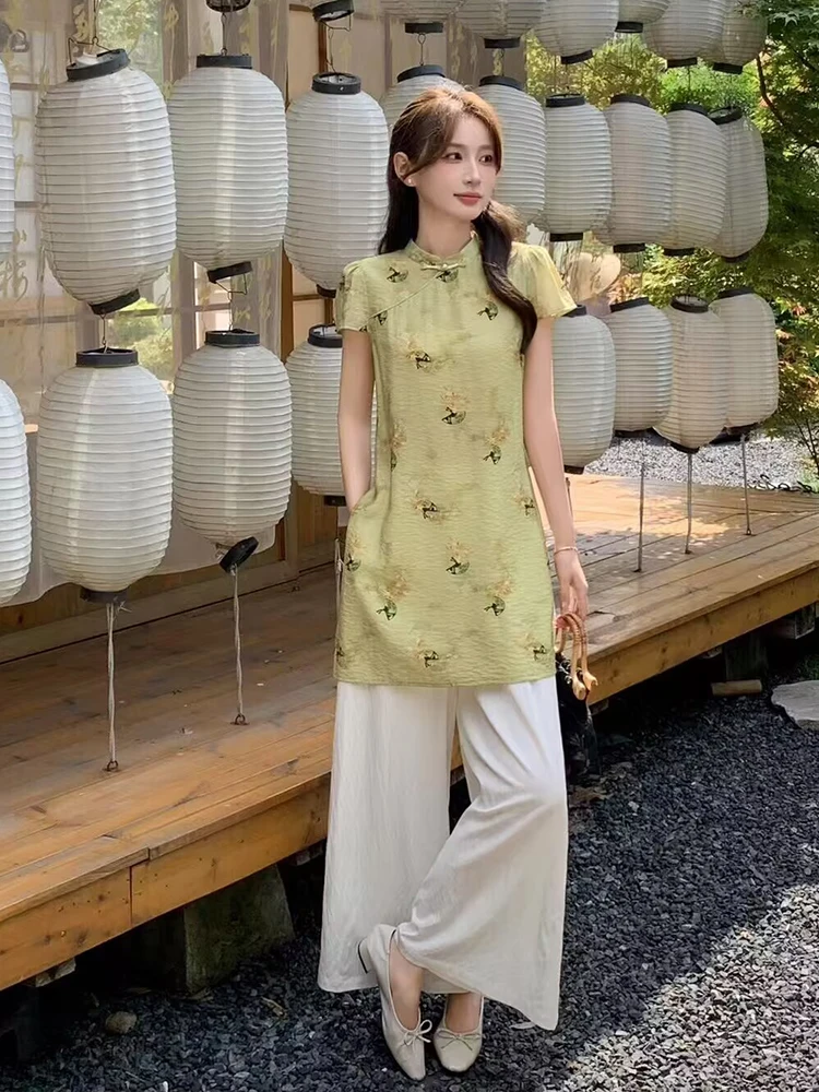 Half-up waves + sage embroidered qipao tunic + ivory palazzo pants + bow flats