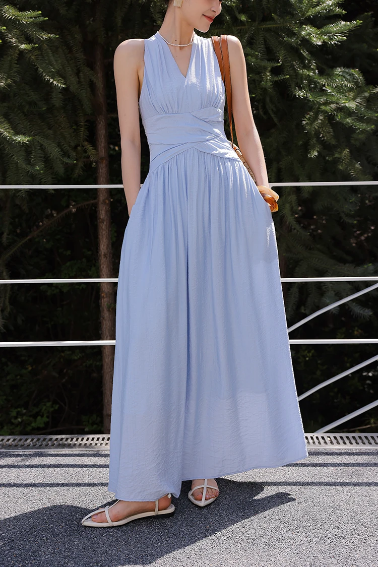 Gold square earrings + powder-blue halter dress + white cross-strap flats
