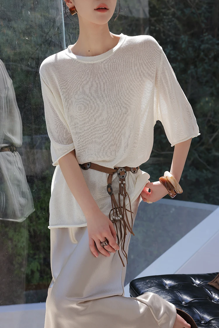 Tortoise hair clip bun + ivory sheer knit tee + suede cord belt with tassels + champagne satin slip skirt