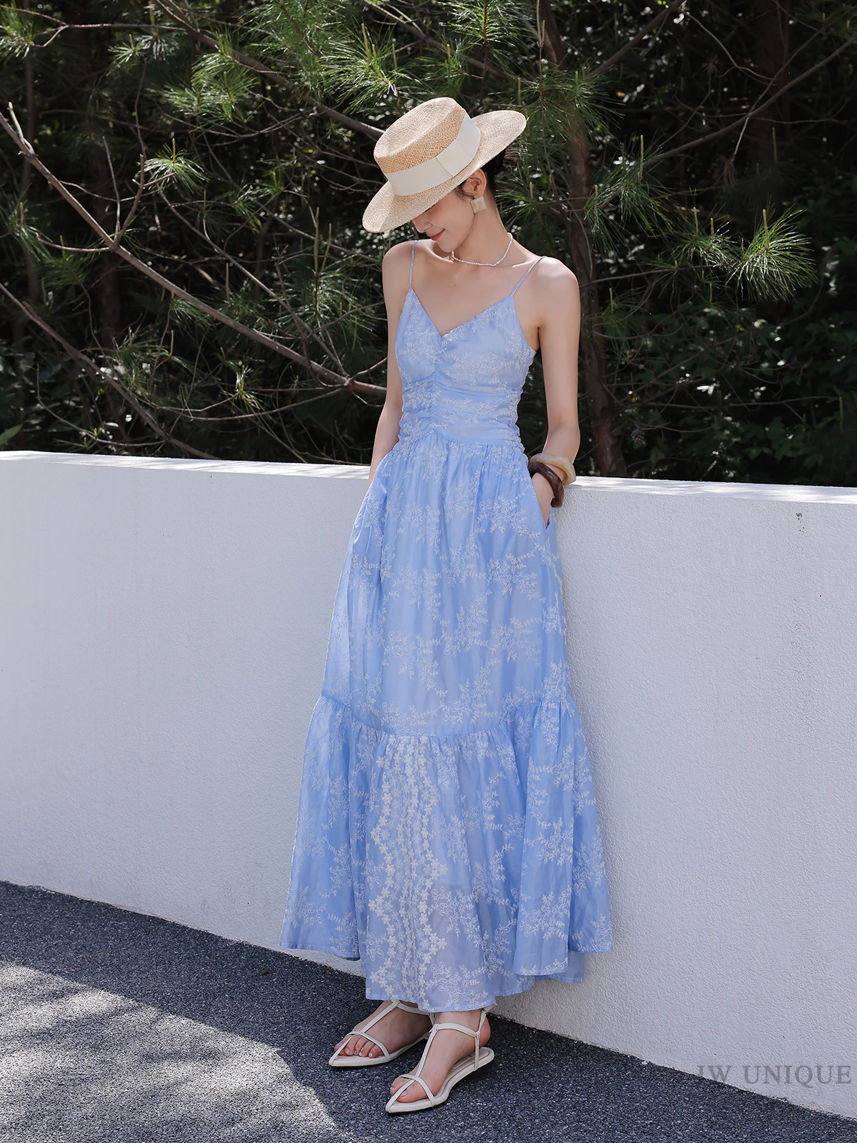 Straw boater + sky-blue ruched maxi + pearl flats