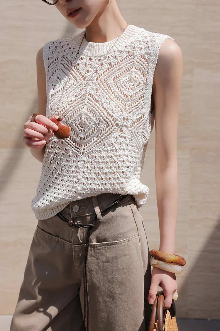 Cat-eye frames + ivory crochet vest + stone-beige carpenter trousers + rope belt