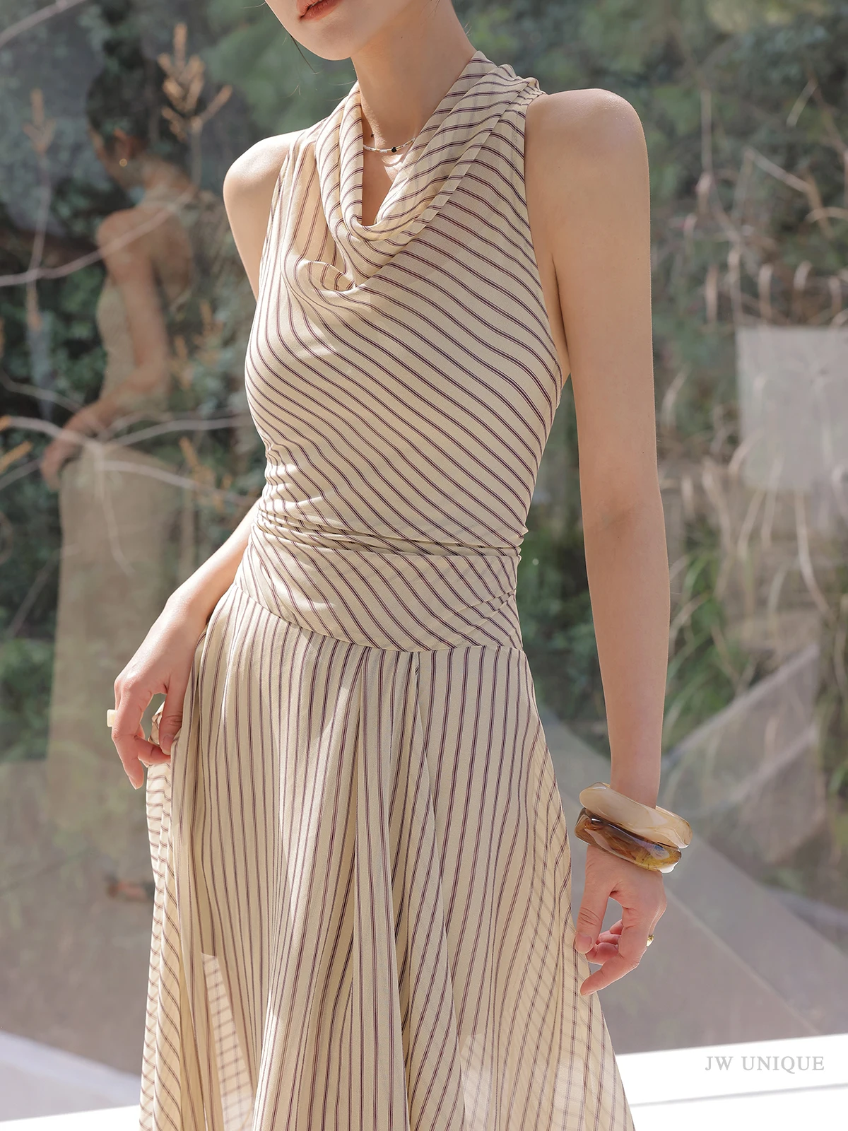 Messy low bun + ivory geometric crochet tank + matching crochet column skirt + tortoiseshell bangles
