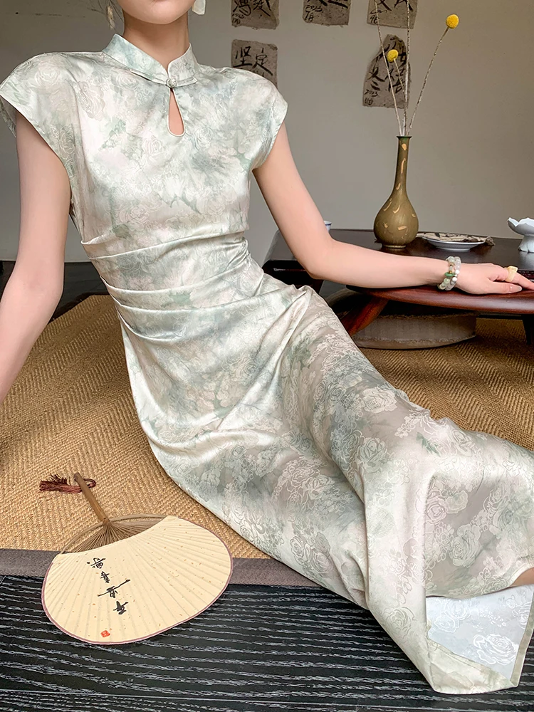 Sleek ponytail + rib knit halter tank + olive wide-pleat trousers + woven pyramid tote