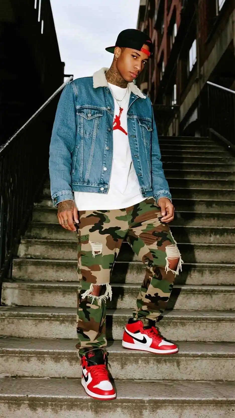 Denim Jacket + White Tee + Camo Ripped Skinny Jeans + Red-White High-Top Sneakers + Black Snapback