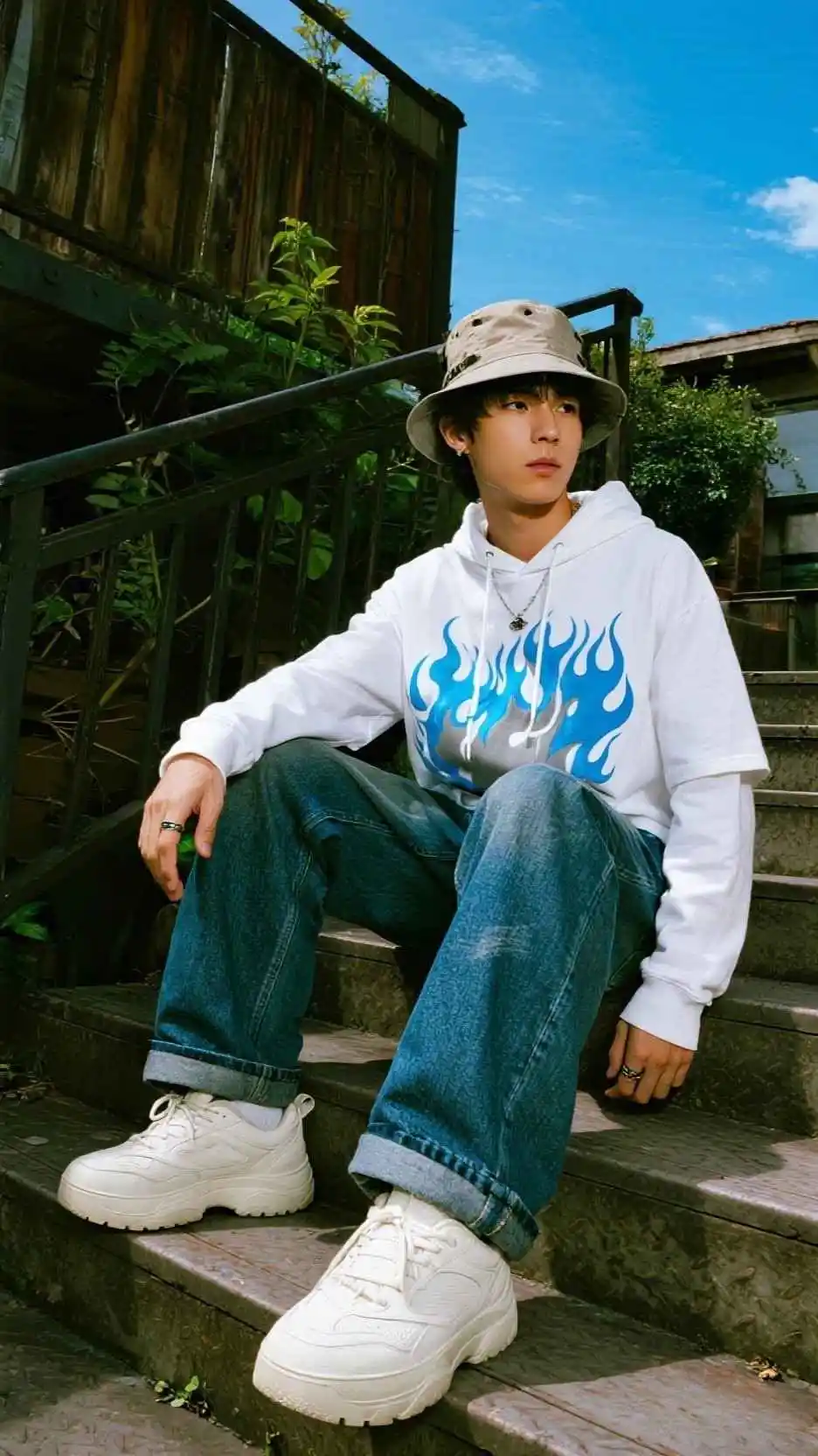 Flame Graphic Hoodie + Dark Wide-Leg Denim + White Chunky Sneakers + Fuzzy Bucket Hat