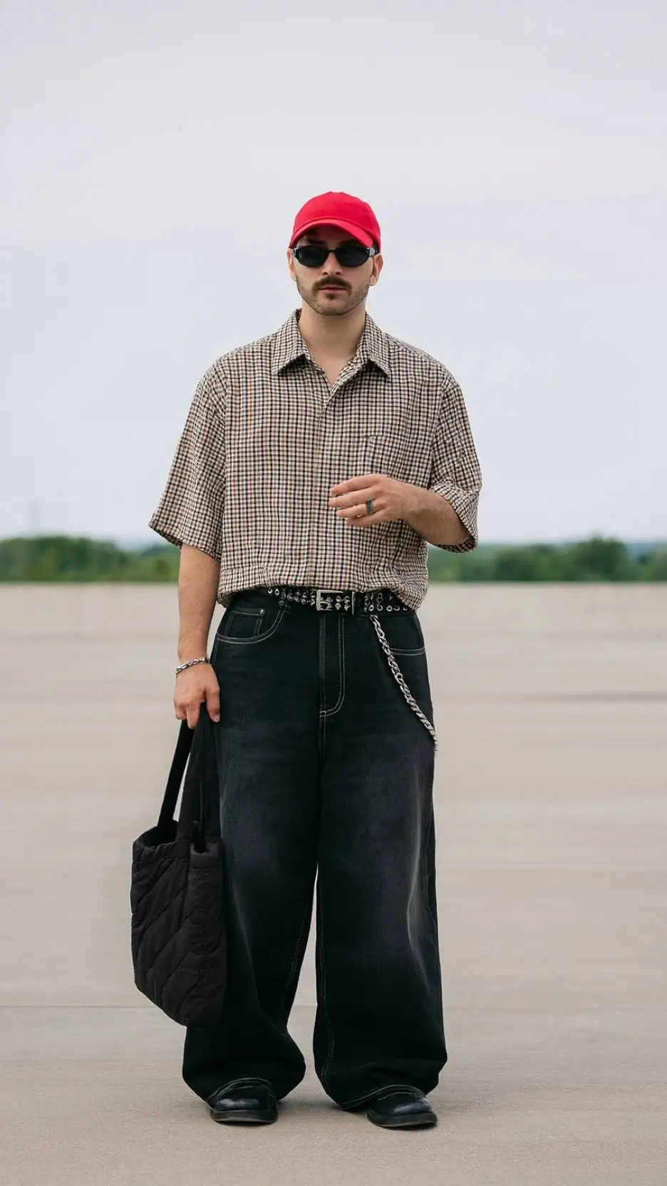 Brown Gingham Camp Shirt + Black Wide Jeans + Chunky Black Loafers + Red Baseball Cap