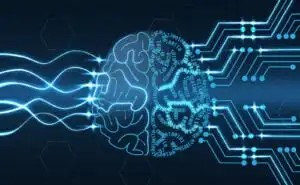 a graphic of the human brain with waves going into the left side and highly digitalized waves coming out the other, signifying the improvement of human knowledge with the help of artificial intelligence