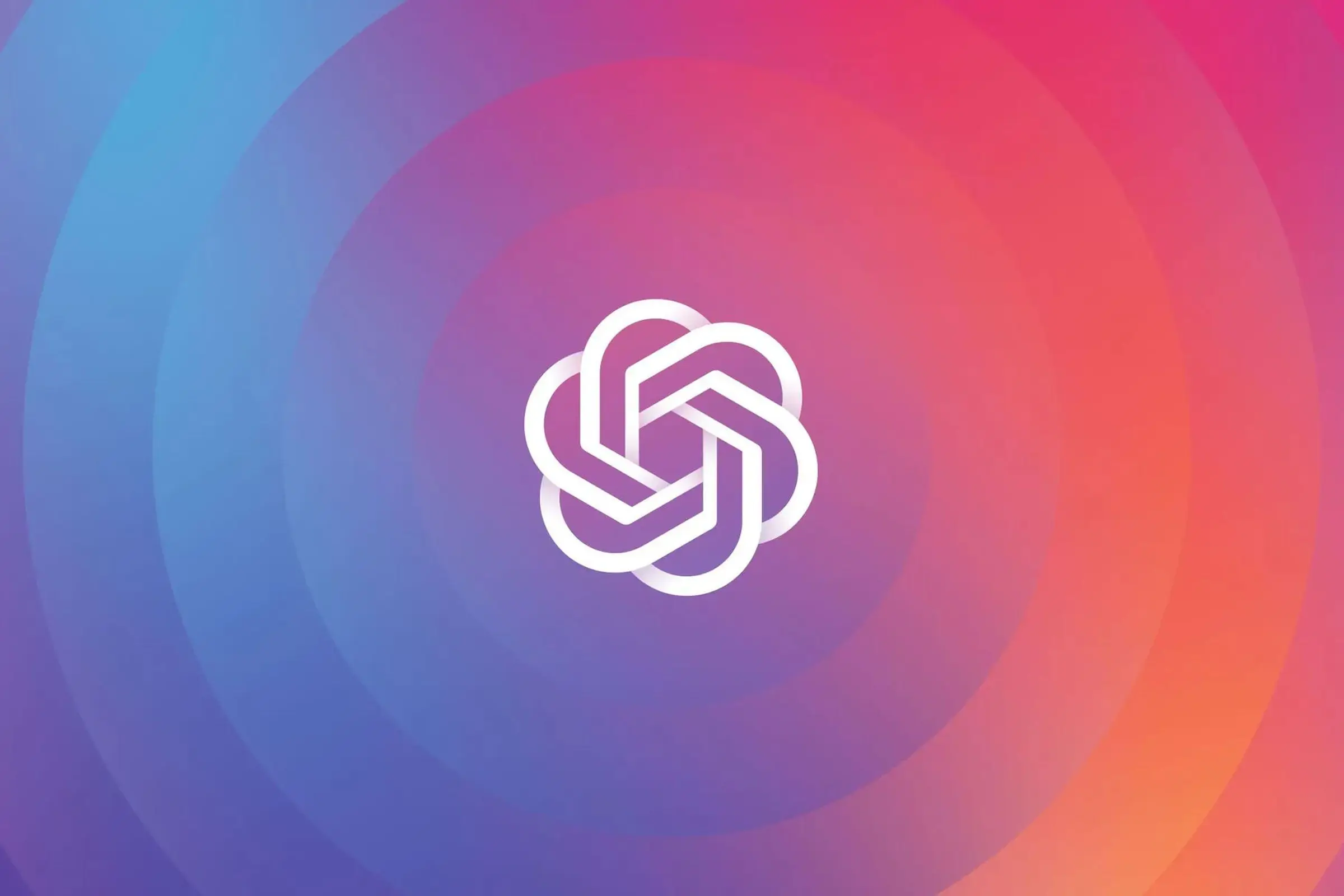 An image of OpenAI’s logo, which looks like a stylized and symmetrical braid.