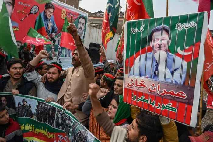 Supporters and activists of Pakistan Tehreek-e-Insaf (PTI) party