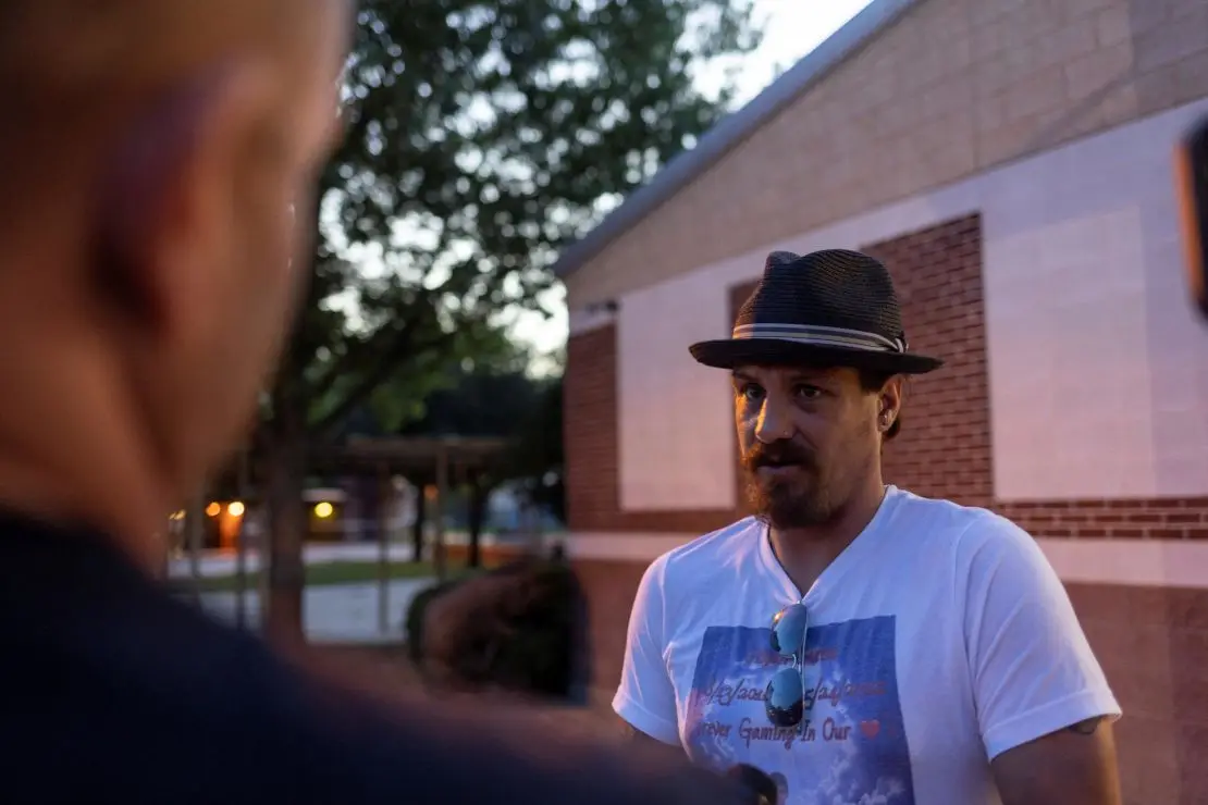 Brett Cross, the uncle of Uziyah Garcia,10, who was slain during the mass shooting at Robb Elementary School, talks with a reporter following a meeting of the Uvalde independent school district’s board of trustees, where he and and other families voiced their concerns about school safety as the start of the new school year approaches in Uvalde, Texas, U.S. August 29, 2022. REUTERS/Nuri Vallbona