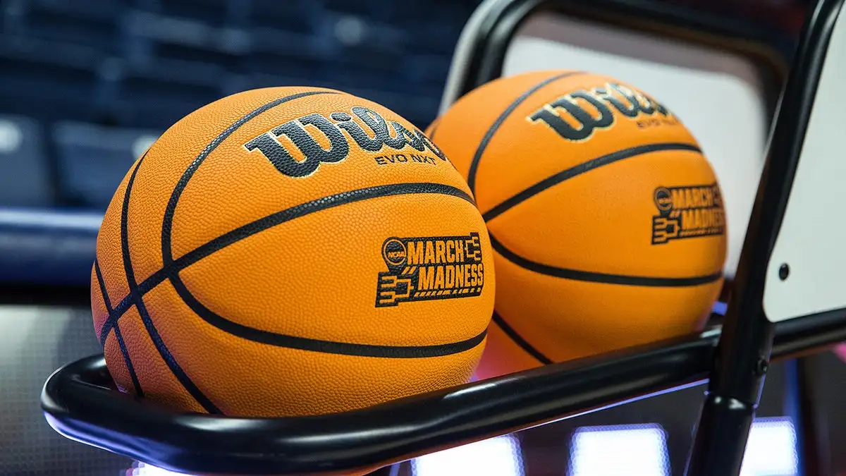 NCAA basketballs on rack